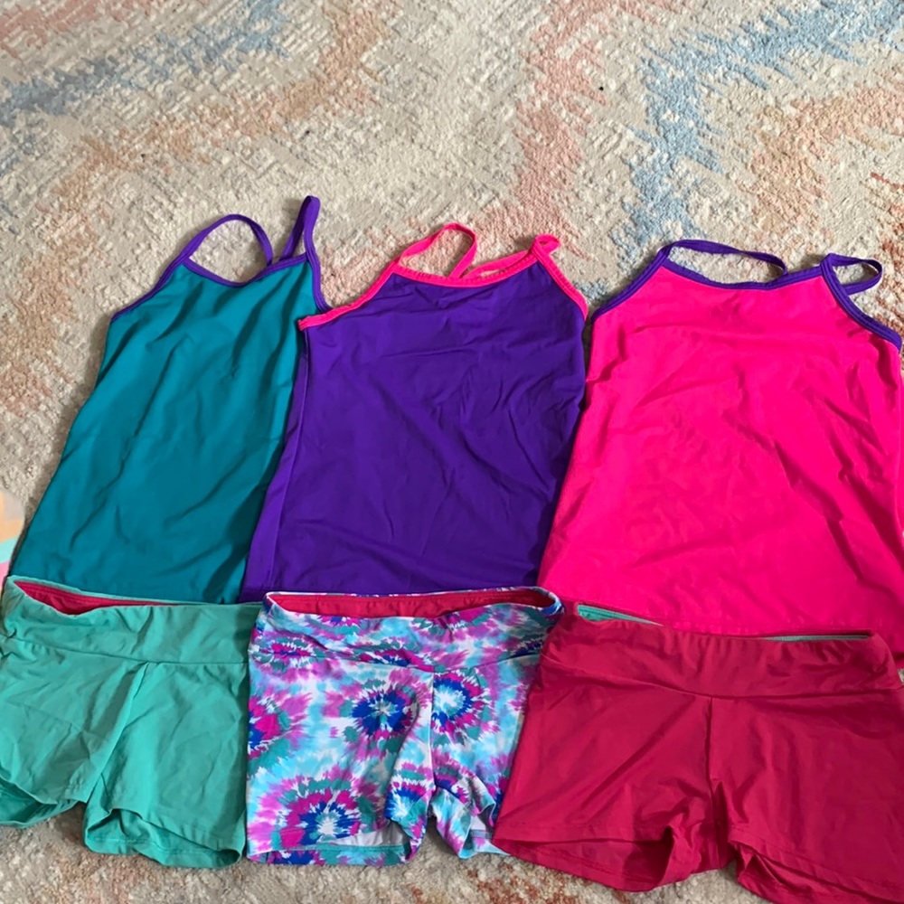 Girls size 7/8 two piece mix and match dance outfits.